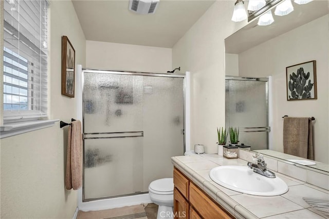 18863 Stonegate Rd, Hidden Valley Lake, CA 95467 - bathroom featuring a shower stall, vanity, and toilet