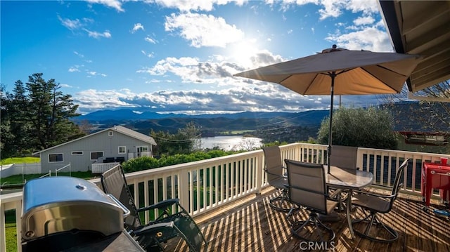 18863 Stonegate Rd, Hidden Valley Lake, CA 95467 - wooden deck featuring a mountain view and outdoor dining space