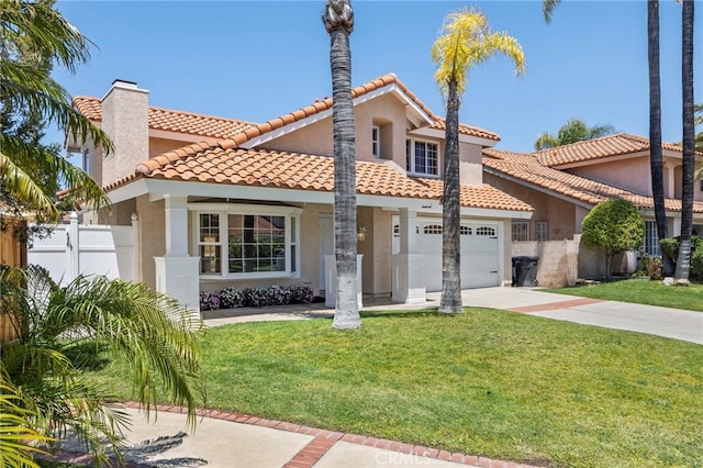mediterranean / spanish-style home featuring a chimney, concrete driveway, stucco siding, a tiled roof, and an attached garage
