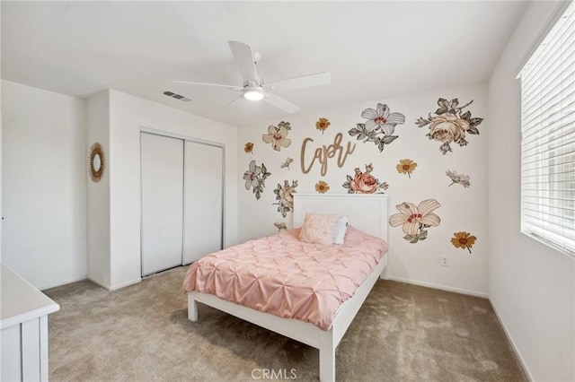 148 Camden Ct, Perris, CA 92571 - bedroom featuring light carpet, a closet, a ceiling fan, and baseboards