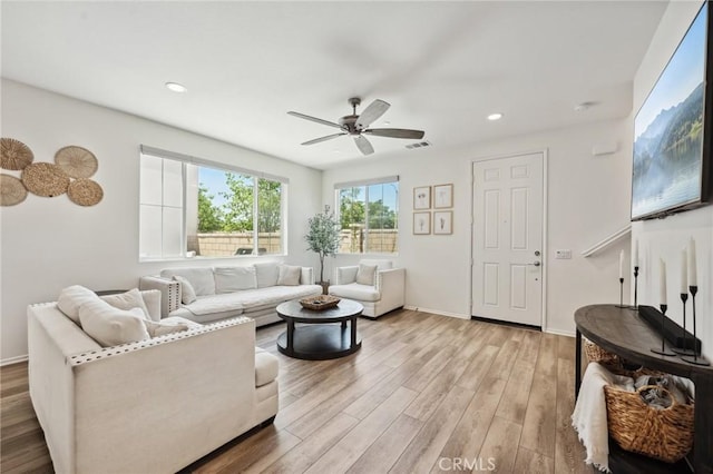 148 Camden Ct, Perris, CA 92571 - living area featuring light wood-style floors, ceiling fan, recessed lighting, and baseboards
