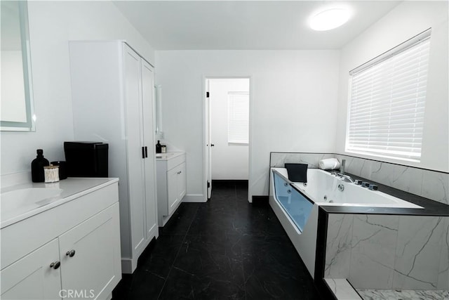 43250 Lago Brezza Dr, Indio, CA 92203 - full bathroom with two vanities and a jetted tub