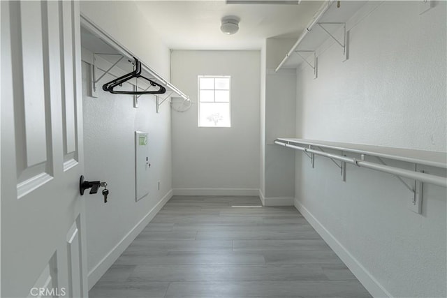43250 Lago Brezza Dr, Indio, CA 92203 - walk in closet with light wood finished floors
