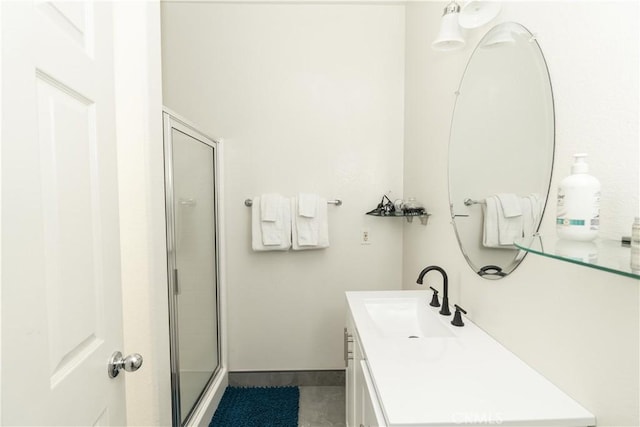 43250 Lago Brezza Dr, Indio, CA 92203 - full bathroom with vanity, a stall shower, and baseboards