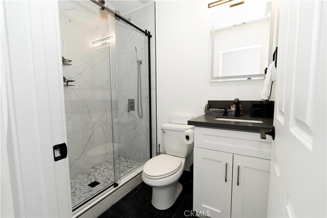 43250 Lago Brezza Dr, Indio, CA 92203 - bathroom with toilet, a marble finish shower, vanity, and tile patterned flooring