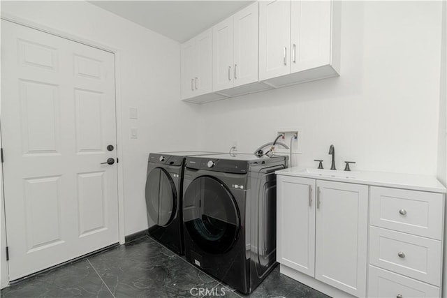 43250 Lago Brezza Dr, Indio, CA 92203 - clothes washing area with cabinet space and washer and clothes dryer