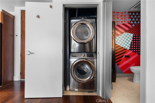 laundry room featuring estacked washer and dryer