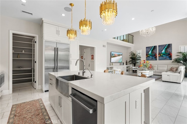 244 Coal Mine, Irvine, CA 92602 - kitchen with a chandelier, stainless steel appliances, a sink, recessed lighting, and light countertops