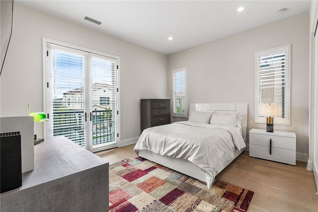 244 Coal Mine, Irvine, CA 92602 - bedroom with access to exterior, light wood-style flooring, recessed lighting, and baseboards