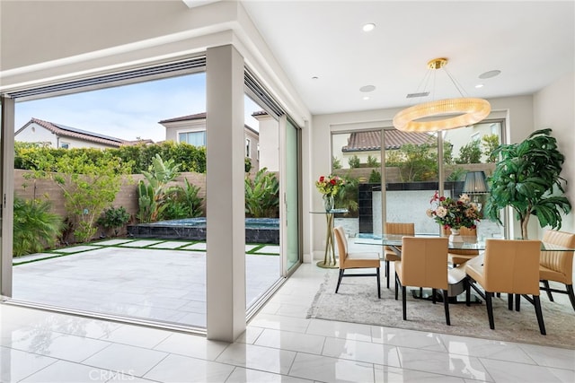 244 Coal Mine, Irvine, CA 92602 - dining space featuring marble look tile flooring and recessed lighting