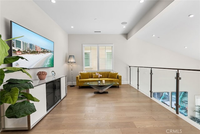 244 Coal Mine, Irvine, CA 92602 - living area featuring light wood finished floors, recessed lighting, and baseboards