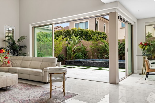 244 Coal Mine, Irvine, CA 92602 - living area with healthy amount of natural light and light marble finish floors