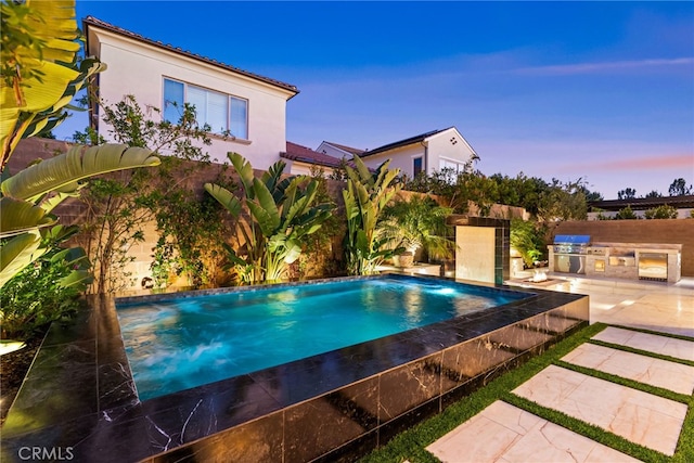 244 Coal Mine, Irvine, CA 92602 - pool at dusk with a patio area
