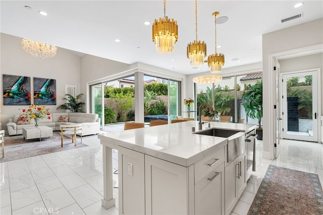 244 Coal Mine, Irvine, CA 92602 - kitchen with a chandelier, a sink, recessed lighting, decorative light fixtures, and light marble finish floors