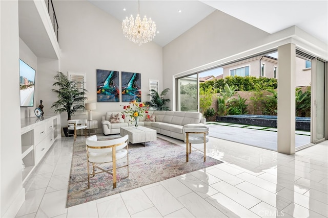 244 Coal Mine, Irvine, CA 92602 - living area with light marble finish floors, a chandelier, and high vaulted ceiling