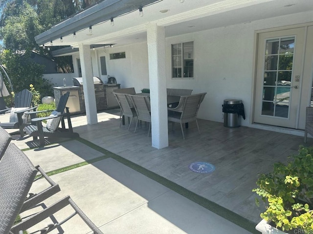 view of patio / terrace with outdoor dining area and area for grilling