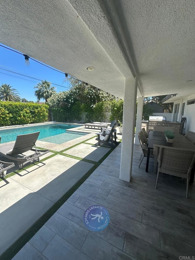 view of patio / terrace featuring outdoor dining area and area for grilling