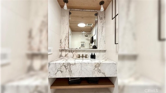 full bathroom with a shower and vanity