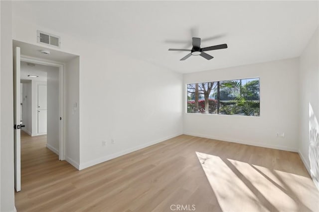 383 N Melrose Dr Unit G, Vista, CA 92083 - empty room featuring light wood-style floors, a ceiling fan, and baseboards