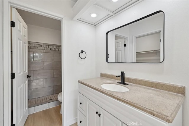 383 N Melrose Dr Unit G, Vista, CA 92083 - full bath with toilet, tiled shower, vanity, and wood finished floors