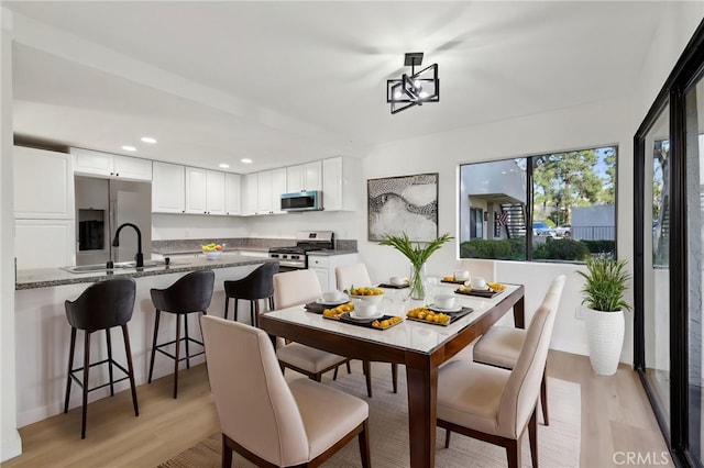 383 N Melrose Dr Unit G, Vista, CA 92083 - dining room featuring light wood-style floors and recessed lighting