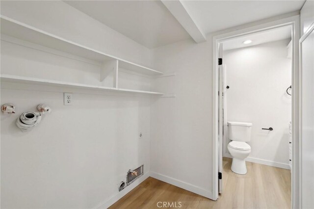 383 N Melrose Dr Unit G, Vista, CA 92083 - laundry room featuring gas dryer hookup, light wood-style floors, and baseboards