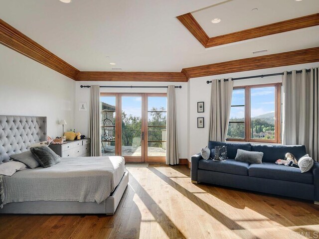 18414 Calle La Serra, Rancho Santa Fe, CA 92091 - bedroom featuring ornamental molding, access to exterior, multiple windows, and wood finished floors
