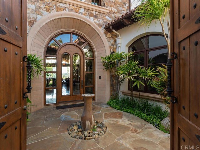 18414 Calle La Serra, Rancho Santa Fe, CA 92091 - property entrance featuring stone siding and french doors