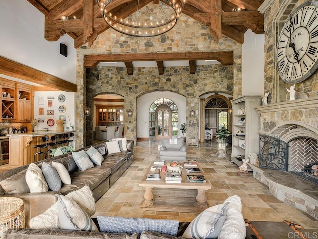 18414 Calle La Serra, Rancho Santa Fe, CA 92091 - living area with arched walkways, beamed ceiling, high vaulted ceiling, bar area, and wine cooler