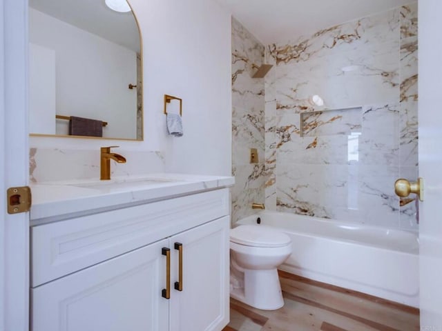 1025 Plover Way, Oceanside, CA 92057 - full bath with vanity, toilet, shower / tub combination, and wood finished floors