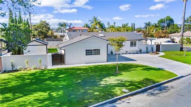 18011 Theodora Dr, Tustin, CA 92780 - view of front of home featuring a gate and driveway