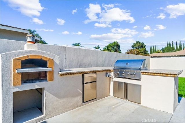 18011 Theodora Dr, Tustin, CA 92780 - view of patio / terrace with area for grilling