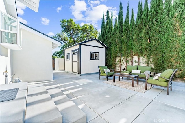 18011 Theodora Dr, Tustin, CA 92780 - view of patio with an outdoor living space, an outdoor structure, a storage shed, and fence