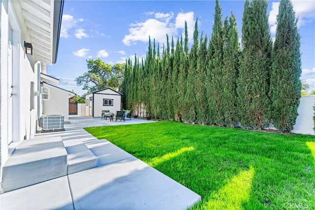 18011 Theodora Dr, Tustin, CA 92780 - view of green lawn featuring a patio area and cooling unit