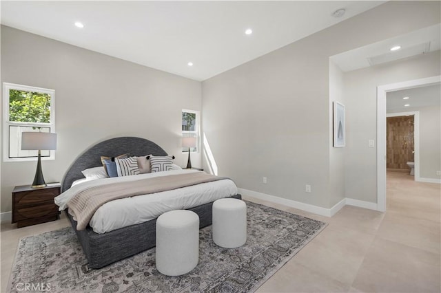 bedroom with recessed lighting and baseboards