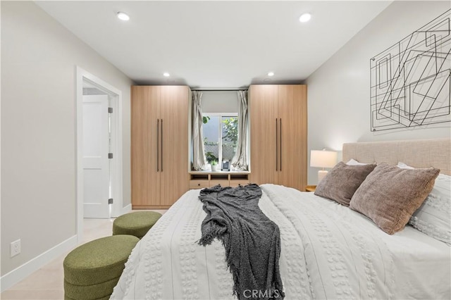 bedroom with recessed lighting and baseboards