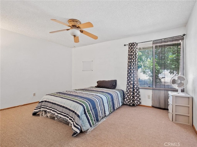 17949 Catalpa St, Hesperia, CA 92345 - carpeted bedroom with a textured ceiling, ceiling fan, and baseboards