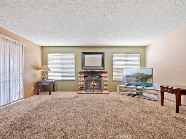 17949 Catalpa St, Hesperia, CA 92345 - living area featuring carpet, plenty of natural light, a textured ceiling, and a fireplace