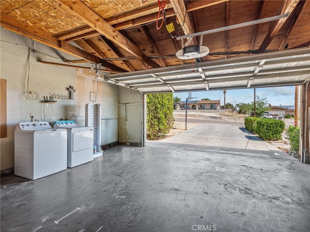 17949 Catalpa St, Hesperia, CA 92345 - garage with washer and clothes dryer and a garage door opener