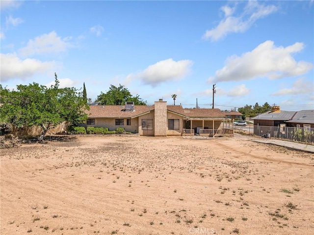 17949 Catalpa St, Hesperia, CA 92345 - back of property with fence and a chimney