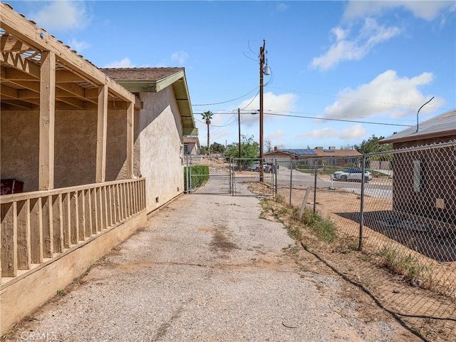 17949 Catalpa St, Hesperia, CA 92345 - view of road with a gate and a gated entry