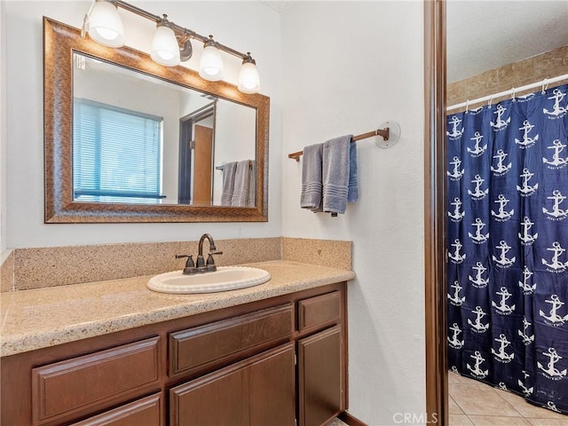 17949 Catalpa St, Hesperia, CA 92345 - full bath featuring vanity, a shower with curtain, and tile patterned flooring