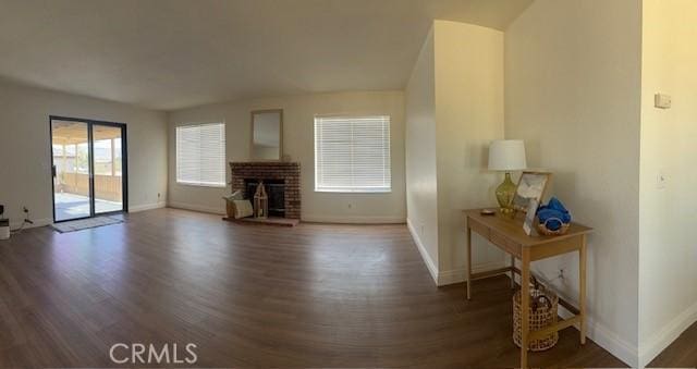 17949 Catalpa St, Hesperia, CA 92345 - living area featuring wood finished floors and a brick fireplace