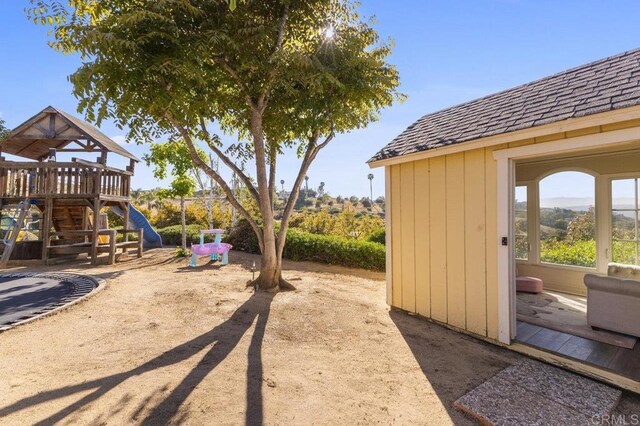 view of yard featuring a playground