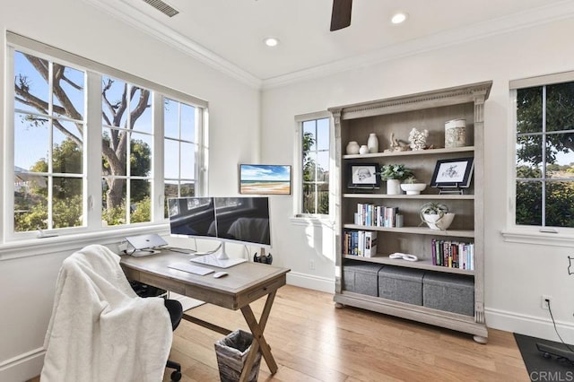home office featuring light wood finished floors, a ceiling fan, baseboards, ornamental molding, and recessed lighting