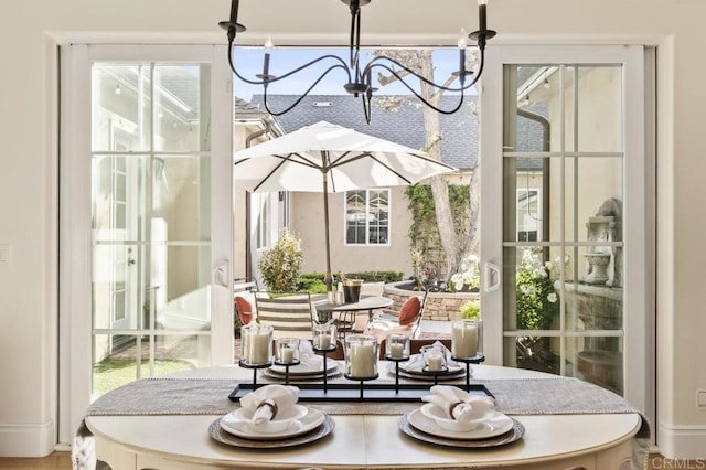 dining area featuring a chandelier