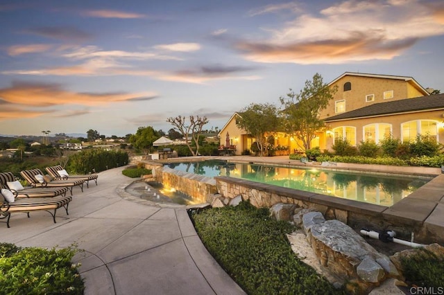 swimming pool with a patio