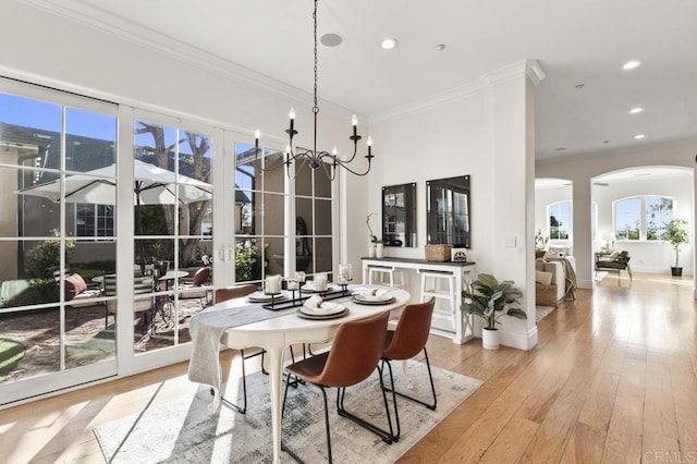 sunroom featuring arched walkways