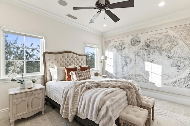 bedroom with light colored carpet, recessed lighting, ceiling fan, and crown molding