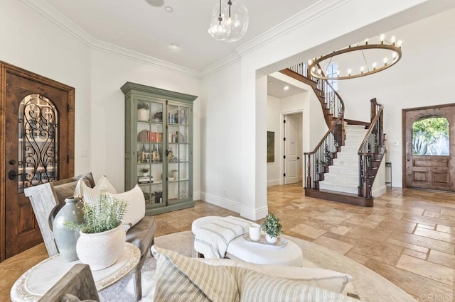 dining room featuring a chandelier, baseboards, stone tile flooring, ornamental molding, and stairs
